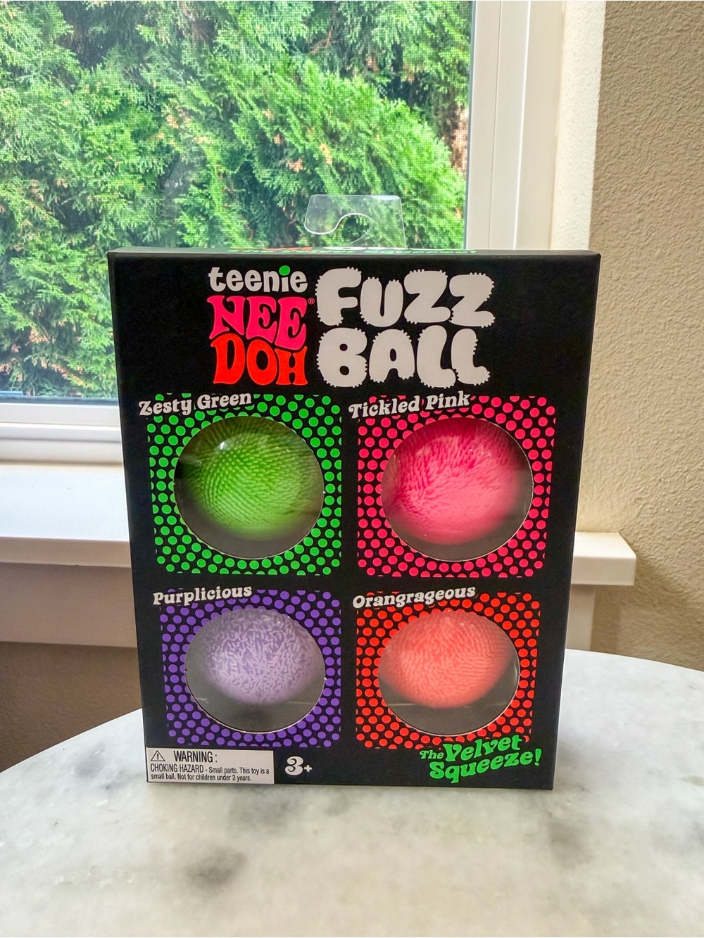 teenie NEEDOH Fuzz Ball 4-Pack in Green, Pink, Purple and Orange